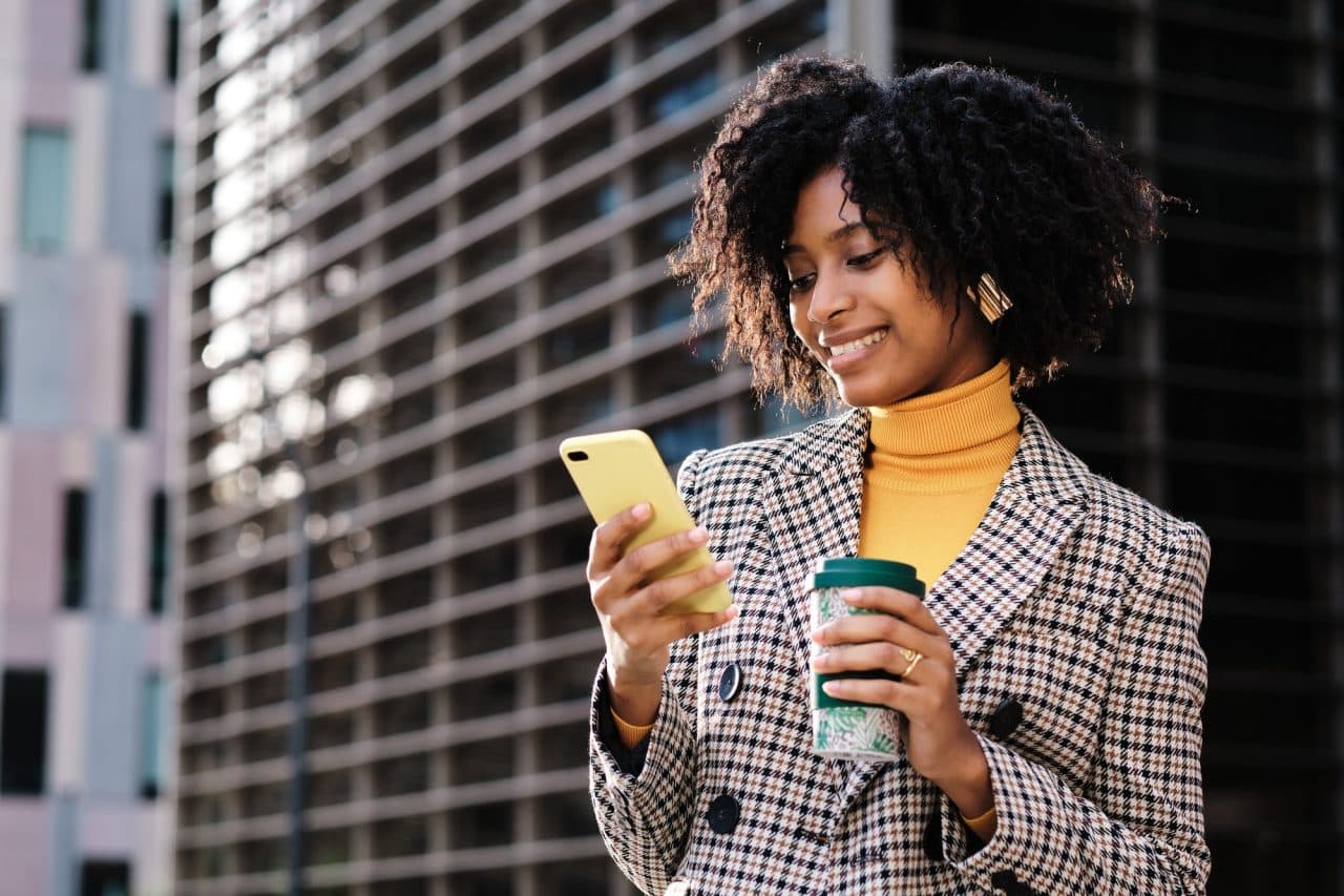 Business woman using mobile phone